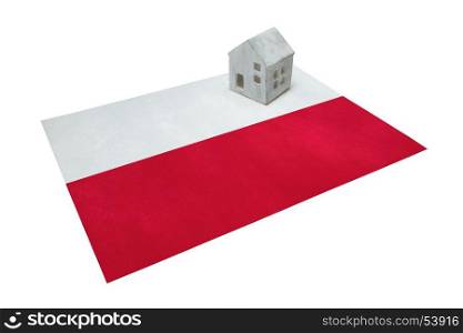 Small house on a flag - Living or migrating to Poland