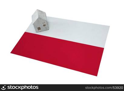 Small house on a flag - Living or migrating to Poland