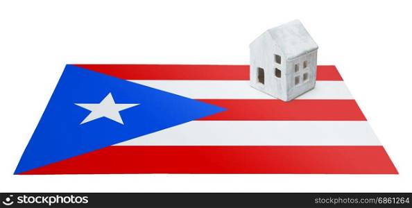 Small house on a flag - Living or migrating to Puerto Rico