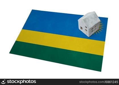 Small house on a flag - Living or migrating to Rwanda