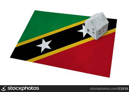 Small house on a flag - Living or migrating to Saint Kitts and Nevis