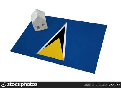 Small house on a flag - Living or migrating to Saint Lucia