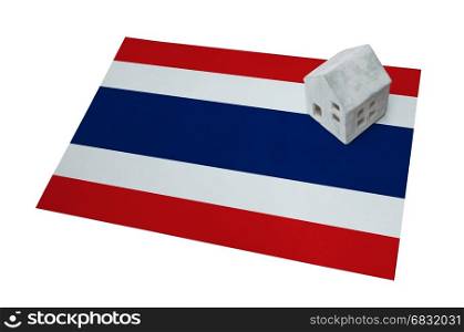 Small house on a flag - Living or migrating to Thailand