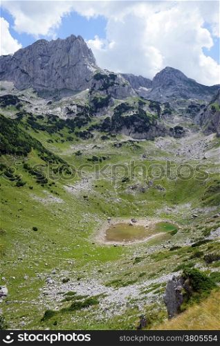 Small lake and mountain in Durmitor national park, Montenegro