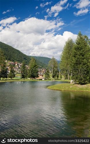 small lake in Vermiglio, Trentino, Italy