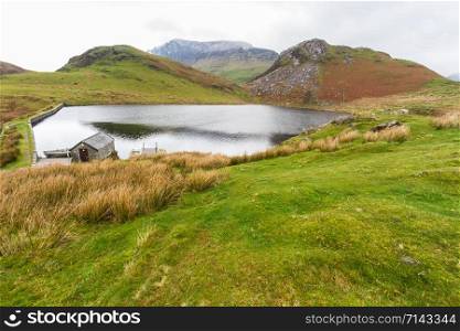 Small lake or reservoir of Llyn y Dywarchen, Rhyd Ddu, Snowdonia, North Wales, Gwynedd, landscape
