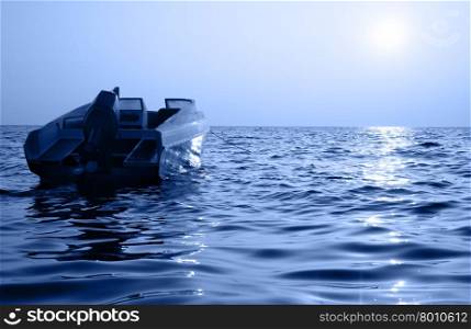 Small motorized boat and sea at sunrise