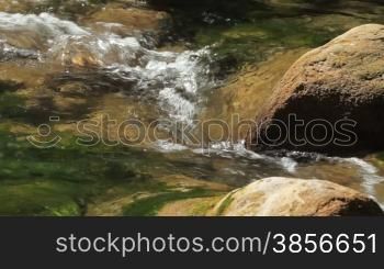 small mountain stream with rocks in Crimea.