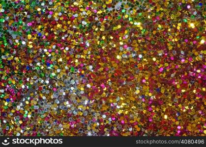 Small multicolored sequins as background