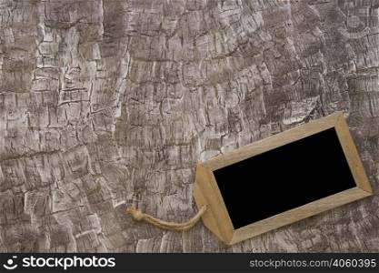 small narrow slate with string background