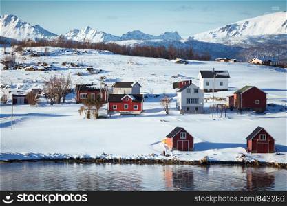 small Norwegian village on the shore of the fjord. Lofoten Islands. Norway.