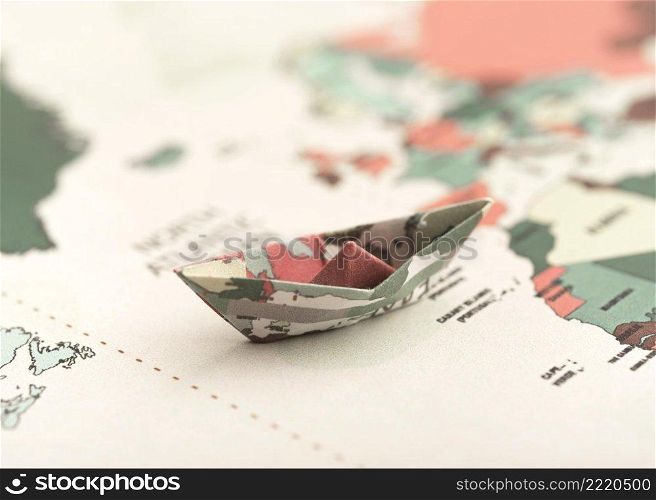 small origami boat world map