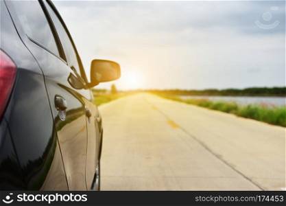 Small passenger car seat on the road used for daily trips.,Car parked on road rock mountain background nature sunlight