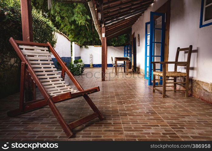 Small patio with tables and chairs. brazil