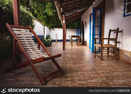 Small patio with tables and chairs. brazil