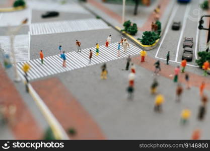 Small people or small people walk on many streets. Selective focus