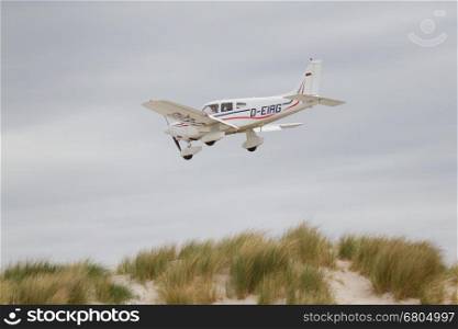 Small plane on approach at the airport on Dune (Helgoland)