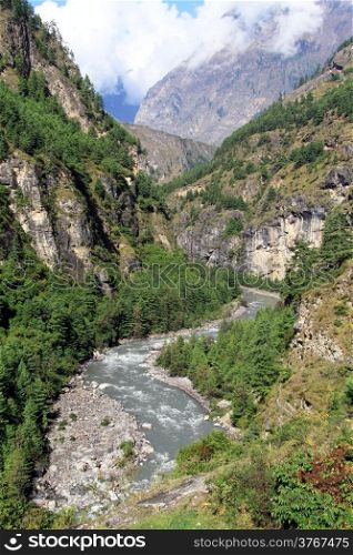 Small river and mountain near Manaslu in Nepal
