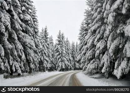 small road with snowdrifts