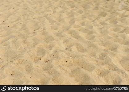 Small sand dunes on beach. Sand texture