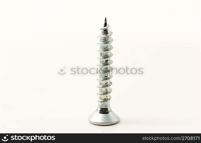 small screw. one small screw isolated on white background