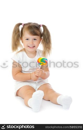 Small smiling girl with lollipop isolated