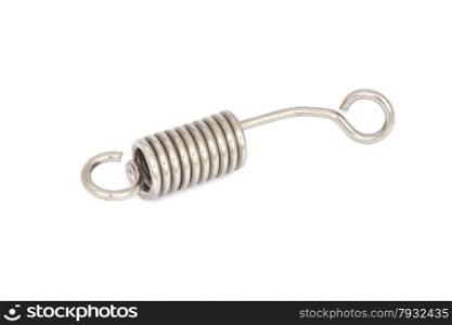 Small steel coil spring on white background