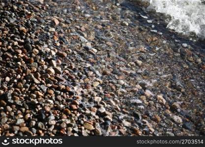 Small stones at seashore
