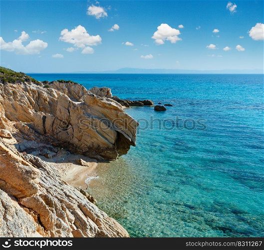 Small summer sandy beach and rocky coast near Platanitsi Beach (Sithonia Peninsula, Chalcidice, Greece).
