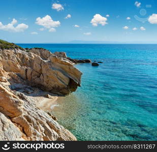 Small summer sandy beach and rocky coast near Platanitsi Beach (Sithonia Peninsula, Chalcidice, Greece).