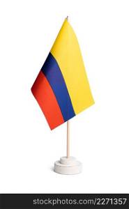 Small table flag of Colombia isolated on white background