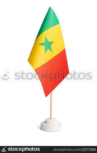 Small table flag of Senegal isolated on white background