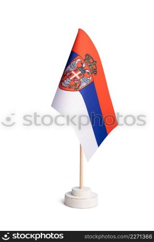 Small table flag of Serbia isolated on white background