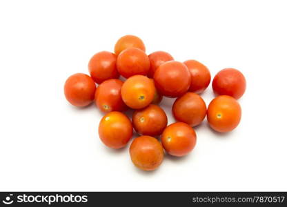 small tomatoes on a white background