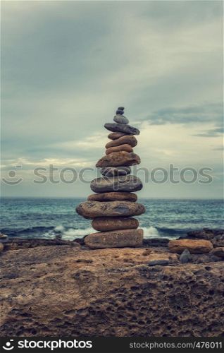 Small tower of stones on the coast