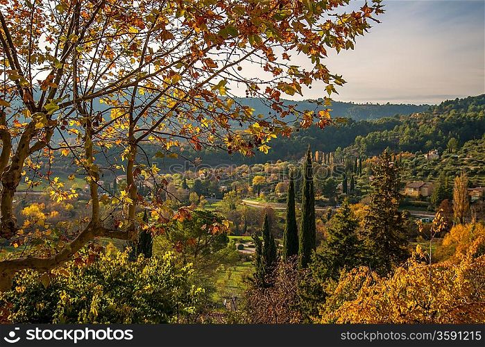 Small town view in autumn landscape