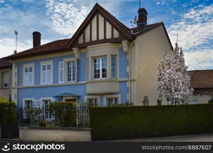 Small villa with a blue facade in a small village . Small villa with a blue facade in a small village near the lake of madine in the department of meuse in France