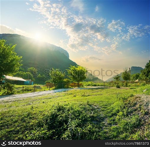Small village in mountains in a sunny morning