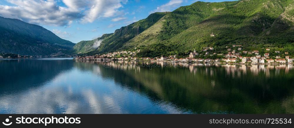 Small village of Prcanj on coastline of Gulf of Kotor in Montenegro. Town of Prcanj on the Bay of Kotor in Montenegro