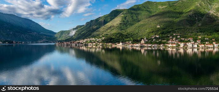 Small village of Prcanj on coastline of Gulf of Kotor in Montenegro. Town of Prcanj on the Bay of Kotor in Montenegro