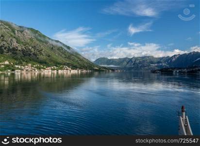 Small villages of Prcanj and Dobrota on coastline of Gulf of Kotor in Montenegro. Towns of Prcanj and Dobrota on the Bay of Kotor in Montenegro
