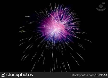 Small Violet Sparkling Fireworks Background on Night Scene. Abstract color fireworks background and smoke on sky