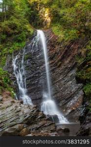 small waterfall in the Carpathian mountains. Guk