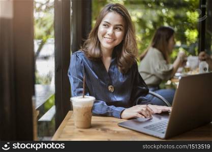 Smart business woman is working with computer