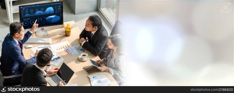 Smart businessman and businesswoman talking discussion in widen group meeting at office table in a modern office interior. Business collaboration strategic planning and brainstorming of coworkers.. Smart businessman and businesswoman talking discussion in widen group meeting
