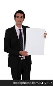 smart businessman making presentation against white background