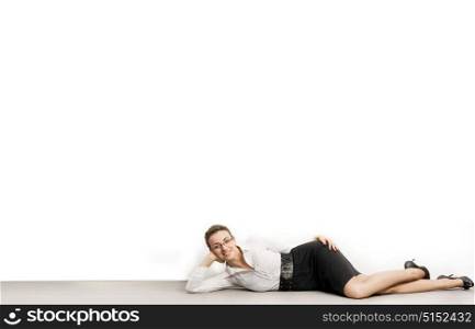 Smart businesswoman posing on a white background