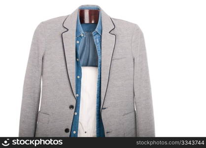 smart casual man dressing for a celebration, event, wedding or night-out on a wooden hanger (shirt, jacket and trousers) isolated on white background