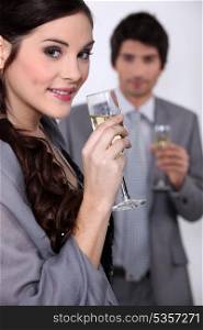 Smart couple drinking champagne