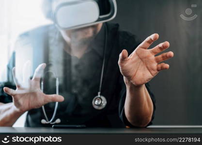 smart doctor wearing virtual reality goggles in modern office with mobile phone using with VR headset